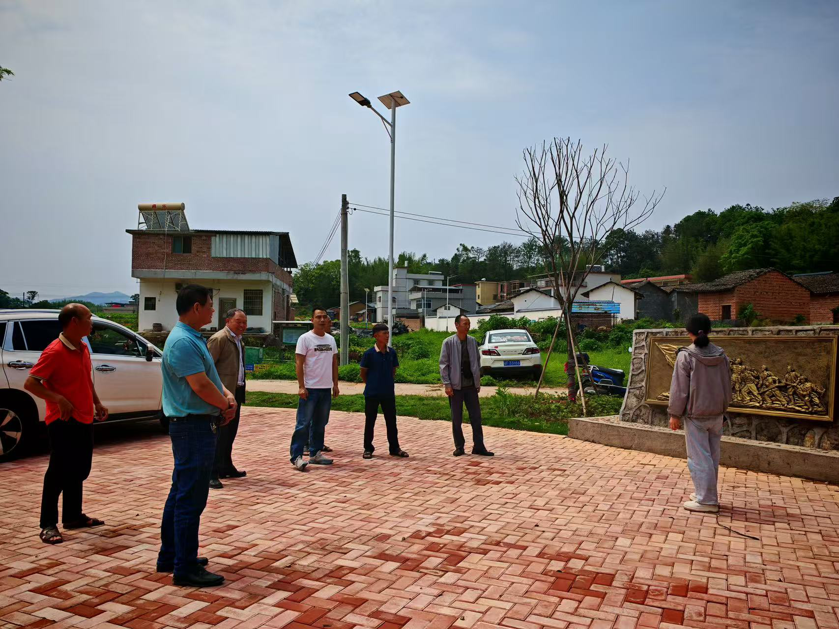 马市镇人大：视察涝洲水村水土保持工程项目.png